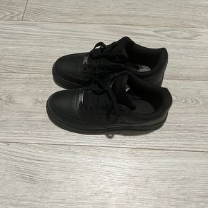 Nike black Air Force one.